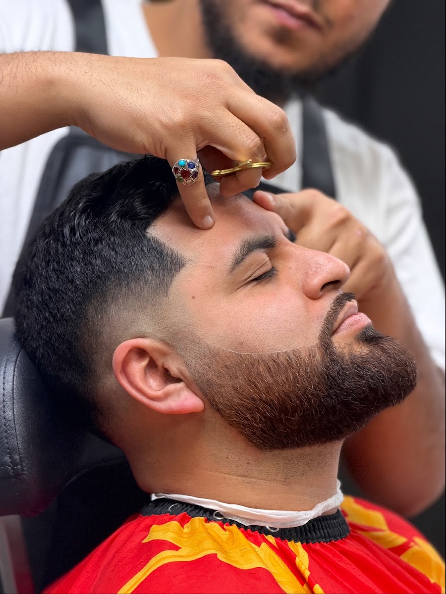 Beard lineup in progress with shears