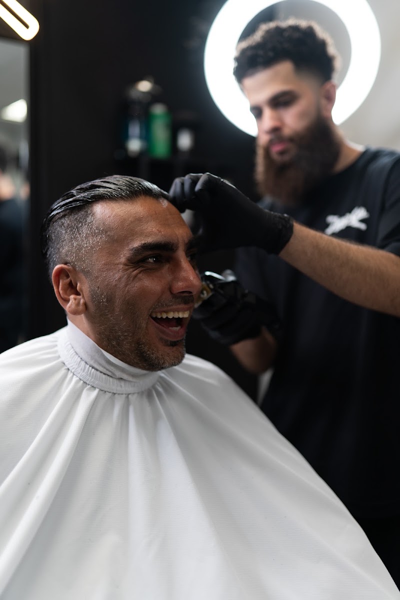 Client laughing mid-haircut